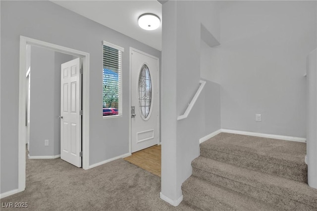 9131 Grand Sunburst Ct, Las Vegas, NV 89149 - carpeted entryway with baseboards and stairway