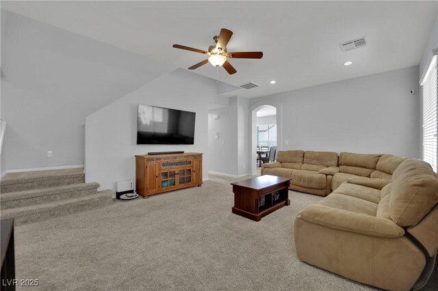 9131 Grand Sunburst Ct, Las Vegas, NV 89149 - living area featuring ceiling fan, carpet floors, arched walkways, recessed lighting, and plenty of natural light