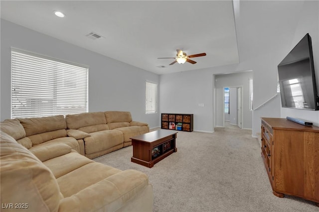 9131 Grand Sunburst Ct, Las Vegas, NV 89149 - living room with ceiling fan and light colored carpet