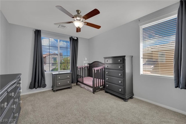 9131 Grand Sunburst Ct, Las Vegas, NV 89149 - carpeted bedroom featuring baseboards and a ceiling fan