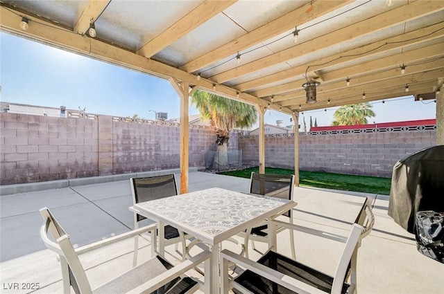1708 Anzio St, Las Vegas, NV 89108 - fenced backyard featuring a patio area, outdoor dining area, and a grill