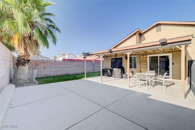 1708 Anzio St, Las Vegas, NV 89108 - fenced backyard with a patio and outdoor dining area