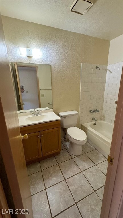 3412 Mercury St Unit I, North Las Vegas, NV 89030 - bathroom with a textured wall, vanity, tile patterned flooring,  shower combination, and a textured ceiling