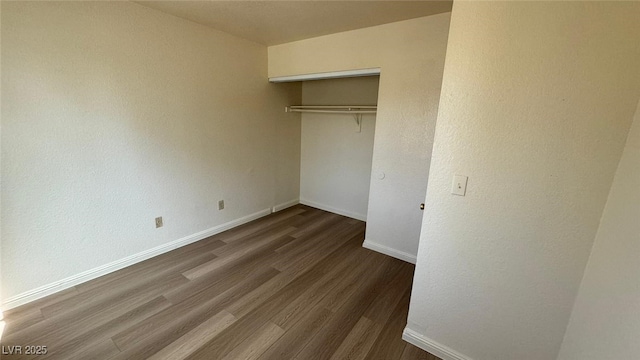 3412 Mercury St Unit I, North Las Vegas, NV 89030 - unfurnished bedroom featuring wood finished floors and a closet