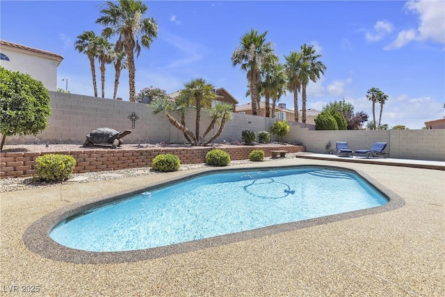 1877 Glory Lily Ct, Las Vegas, NV 89123 - view of swimming pool featuring a fenced backyard and a patio area