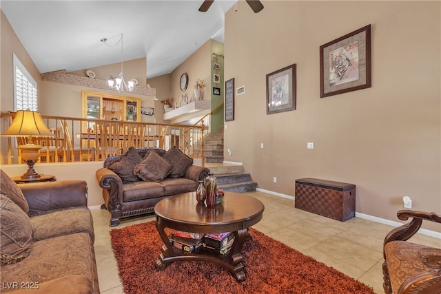 1877 Glory Lily Ct, Las Vegas, NV 89123 - tiled living area featuring a chandelier, a ceiling fan, stairway, and lofted ceiling