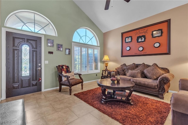 1877 Glory Lily Ct, Las Vegas, NV 89123 - living area with healthy amount of natural light, high vaulted ceiling, a ceiling fan, and light tile patterned flooring