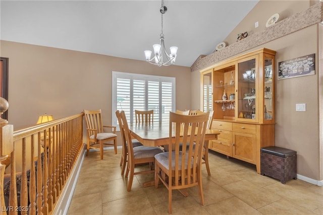 1877 Glory Lily Ct, Las Vegas, NV 89123 - dining space featuring a chandelier, lofted ceiling, and light tile patterned flooring
