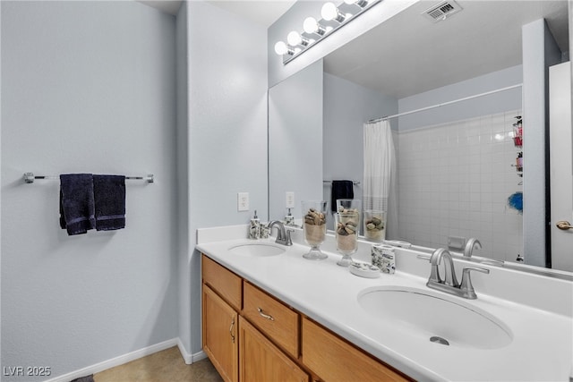 1877 Glory Lily Ct, Las Vegas, NV 89123 - bathroom with double vanity and a shower with curtain