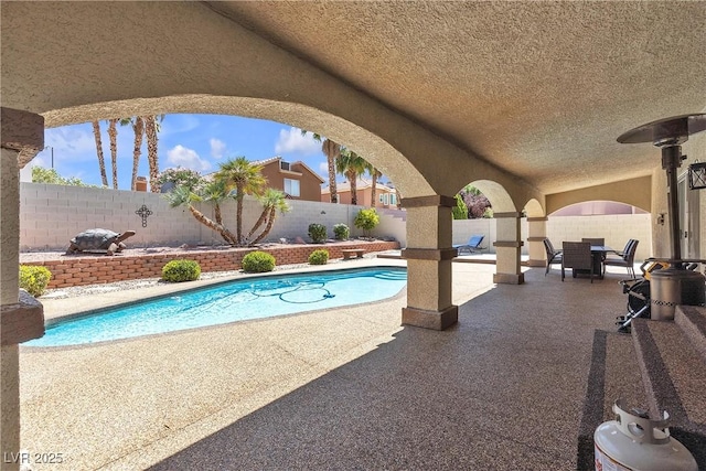 1877 Glory Lily Ct, Las Vegas, NV 89123 - view of swimming pool featuring a patio area and a fenced backyard