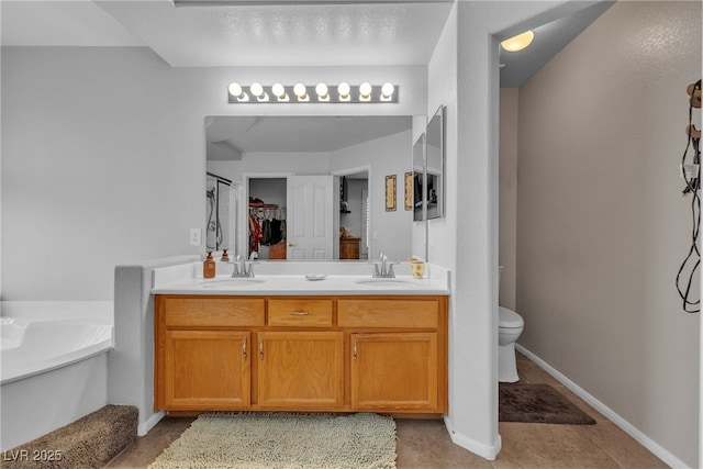 1877 Glory Lily Ct, Las Vegas, NV 89123 - full bathroom featuring double vanity and a tub