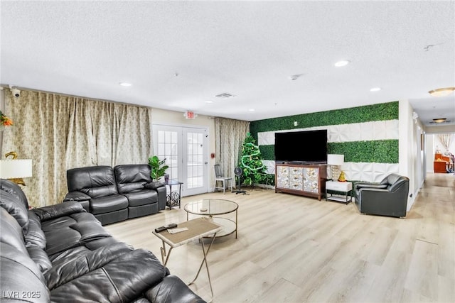 465 E Robindale Rd, Las Vegas, NV 89123 - living area with a textured ceiling, light wood-type flooring, and recessed lighting