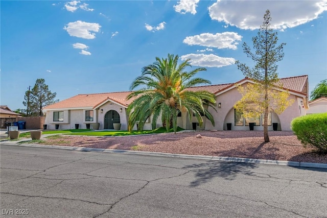 465 E Robindale Rd, Las Vegas, NV 89123 - mediterranean / spanish home featuring stucco siding and a tile roof