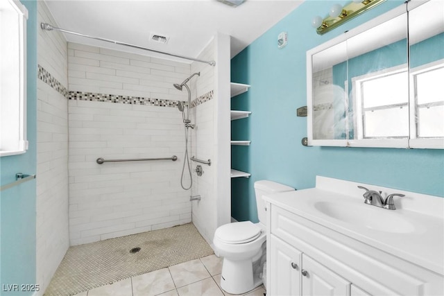465 E Robindale Rd, Las Vegas, NV 89123 - full bathroom with tiled shower, vanity, and tile patterned flooring