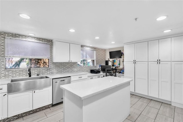 465 E Robindale Rd, Las Vegas, NV 89123 - kitchen featuring dishwasher, light countertops, white cabinets, recessed lighting, and a kitchen island