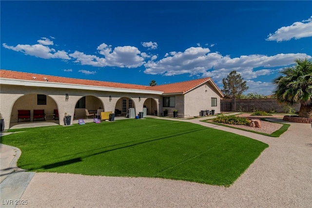 465 E Robindale Rd, Las Vegas, NV 89123 - back of house featuring a patio area, stucco siding, and a garage