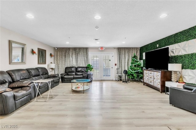 465 E Robindale Rd, Las Vegas, NV 89123 - living area with recessed lighting, light wood-style flooring, and a textured ceiling