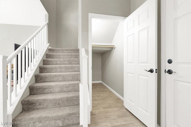 4533 Queens Hill St, North Las Vegas, NV 89031 - stairs featuring wood finished floors and baseboards
