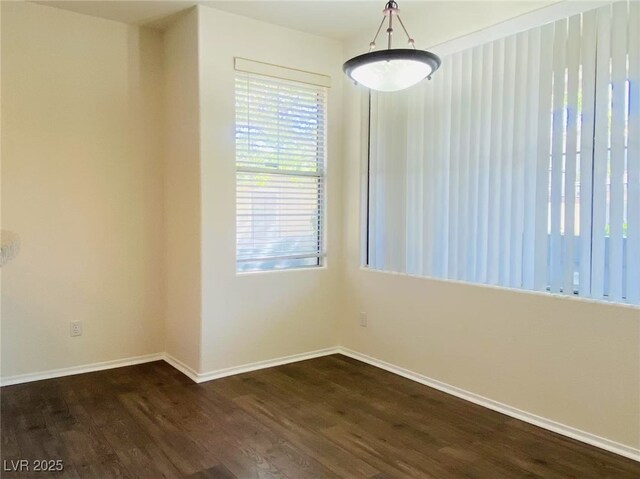 908 Duckhorn Ct Unit 102, Las Vegas, NV 89144 - unfurnished room with dark wood finished floors