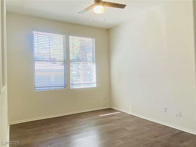 908 Duckhorn Ct Unit 102, Las Vegas, NV 89144 - empty room with dark wood-style floors and ceiling fan
