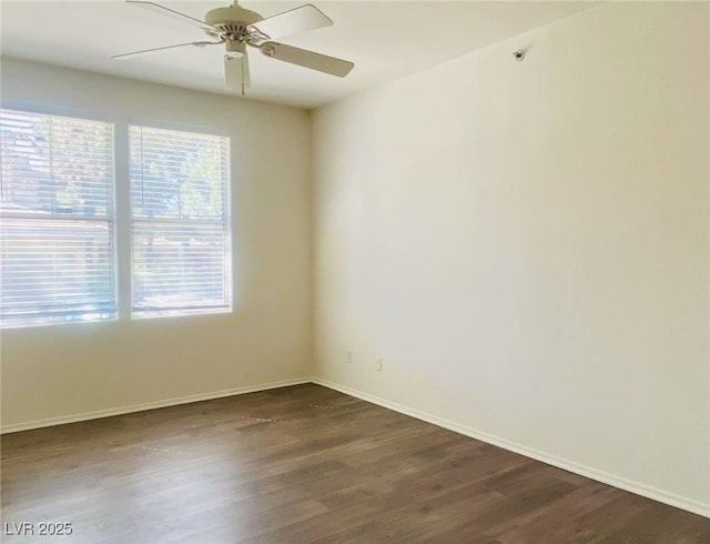 908 Duckhorn Ct Unit 102, Las Vegas, NV 89144 - empty room with dark wood finished floors and a ceiling fan
