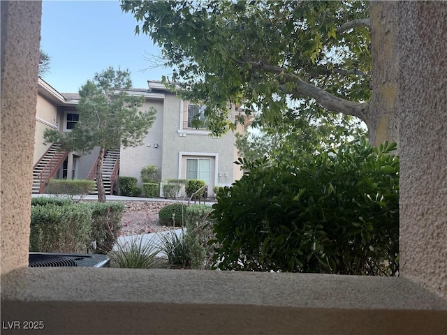 908 Duckhorn Ct Unit 102, Las Vegas, NV 89144 - view of side of home featuring stucco siding