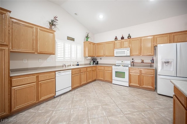 5600 Old Stable Ave, Las Vegas, NV 89131 - kitchen with white appliances, high vaulted ceiling, light countertops, light tile patterned floors, and recessed lighting