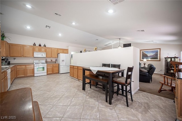 5600 Old Stable Ave, Las Vegas, NV 89131 - dining area with lofted ceiling, light tile patterned floors, and recessed lighting