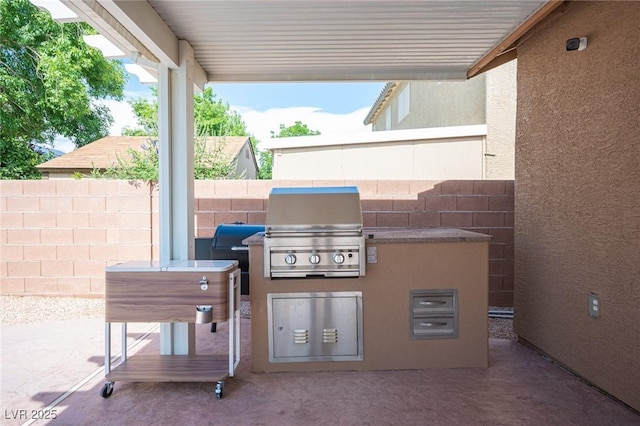 5600 Old Stable Ave, Las Vegas, NV 89131 - view of patio / terrace featuring an outdoor kitchen