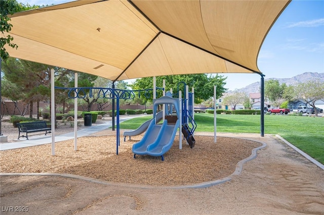 5600 Old Stable Ave, Las Vegas, NV 89131 - communal playground featuring a mountain view and a lawn
