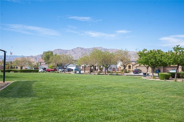 5600 Old Stable Ave, Las Vegas, NV 89131 - view of home's community with a mountain view, a yard, and a residential view