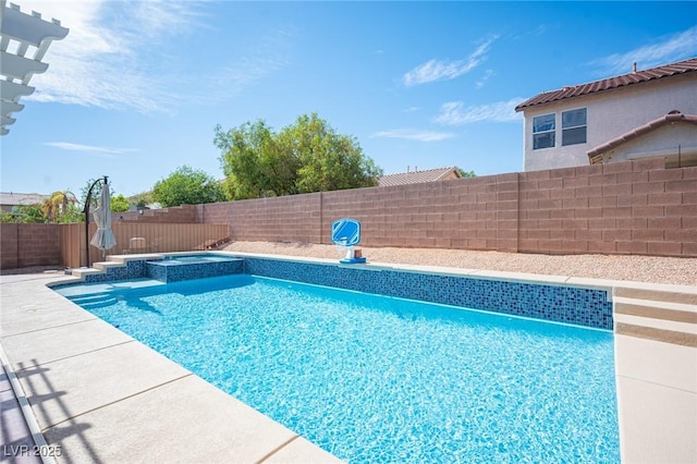 5600 Old Stable Ave, Las Vegas, NV 89131 - view of pool with a fenced backyard and a pool with connected hot tub