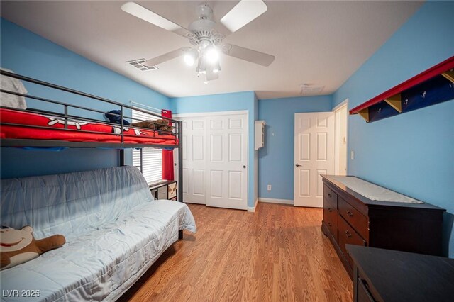 5600 Old Stable Ave, Las Vegas, NV 89131 - bedroom featuring wood finished floors, a ceiling fan, and a closet