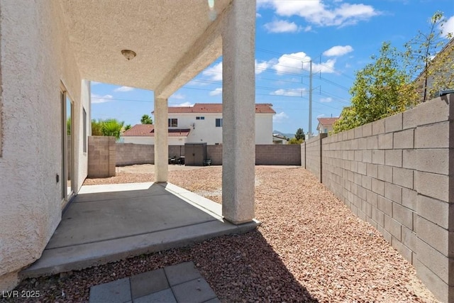 3632 Julia Waldene Ct, Las Vegas, NV 89129 - fenced backyard with a patio
