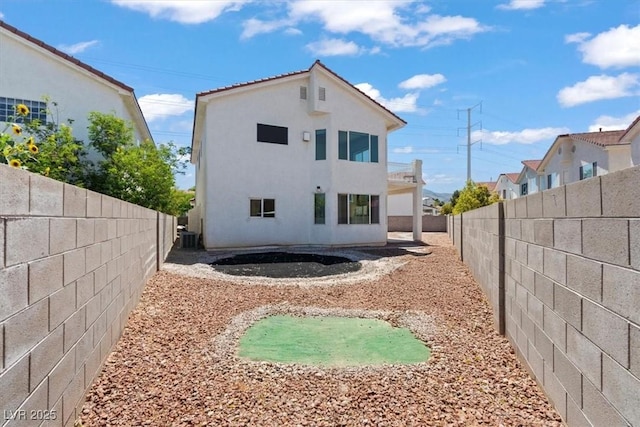3632 Julia Waldene Ct, Las Vegas, NV 89129 - back of house with a fenced backyard and stucco siding