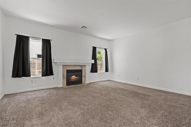 3632 Julia Waldene Ct, Las Vegas, NV 89129 - unfurnished living room with carpet floors and a tile fireplace