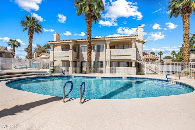 1001 Sulphur Springs Ln Unit 202, Las Vegas, NV 89128 - community pool with a patio