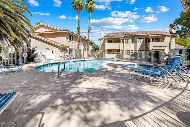 1001 Sulphur Springs Ln Unit 202, Las Vegas, NV 89128 - community pool with a patio area
