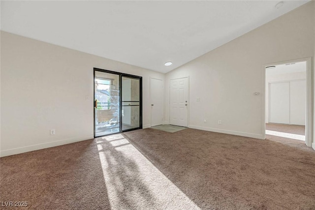 5161 Lindell Rd Unit 206, Las Vegas, NV 89118 - spare room with vaulted ceiling, carpet, and a smoke detector