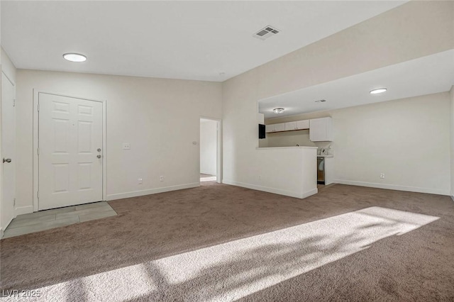 5161 Lindell Rd Unit 206, Las Vegas, NV 89118 - unfurnished living room featuring light colored carpet and baseboards