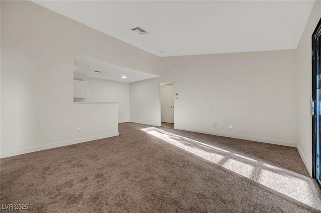 5161 Lindell Rd Unit 206, Las Vegas, NV 89118 - spare room with light colored carpet and vaulted ceiling