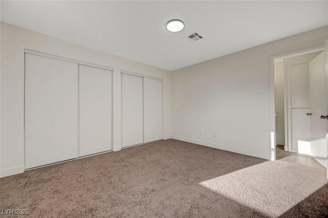 5161 Lindell Rd Unit 206, Las Vegas, NV 89118 - unfurnished bedroom with multiple closets and carpet