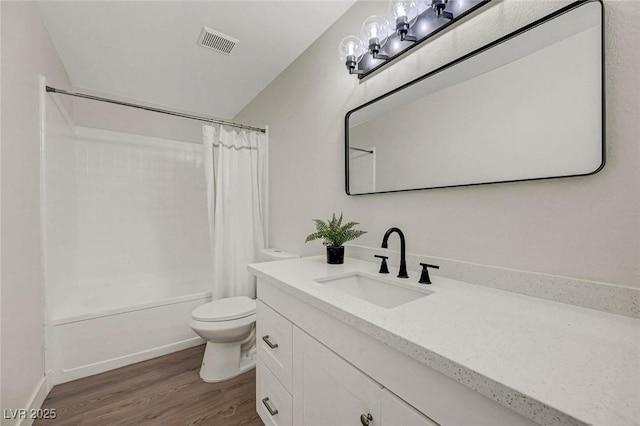 5161 Lindell Rd Unit 206, Las Vegas, NV 89118 - bathroom featuring vanity, shower / bath combo, and wood finished floors