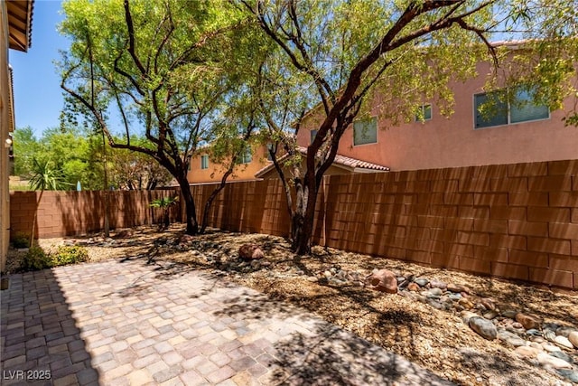10584 Peach Creek St, Las Vegas, NV 89179 - fenced backyard featuring a patio