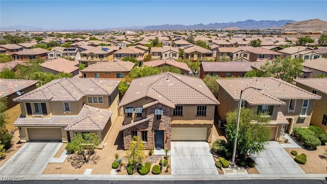 10584 Peach Creek St, Las Vegas, NV 89179 - aerial perspective of suburban area with a mountainous background