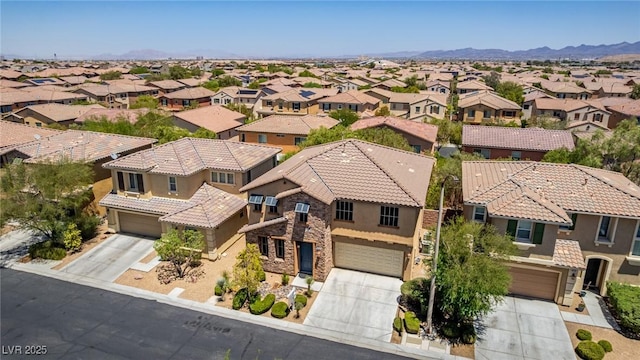 10584 Peach Creek St, Las Vegas, NV 89179 - aerial perspective of suburban area with a mountain backdrop