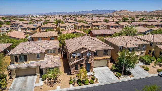 10584 Peach Creek St, Las Vegas, NV 89179 - aerial perspective of suburban area with mountains