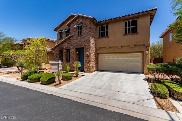 10584 Peach Creek St, Las Vegas, NV 89179 - view of front of home with stucco siding, stone siding, a tile roof, an attached garage, and concrete driveway