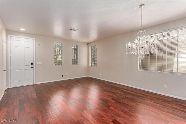 10584 Peach Creek St, Las Vegas, NV 89179 - unfurnished dining area with dark wood-style flooring, a chandelier, and recessed lighting
