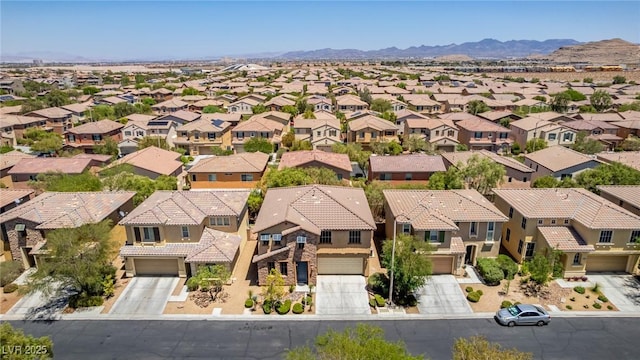 10584 Peach Creek St, Las Vegas, NV 89179 - aerial perspective of suburban area with a mountain backdrop